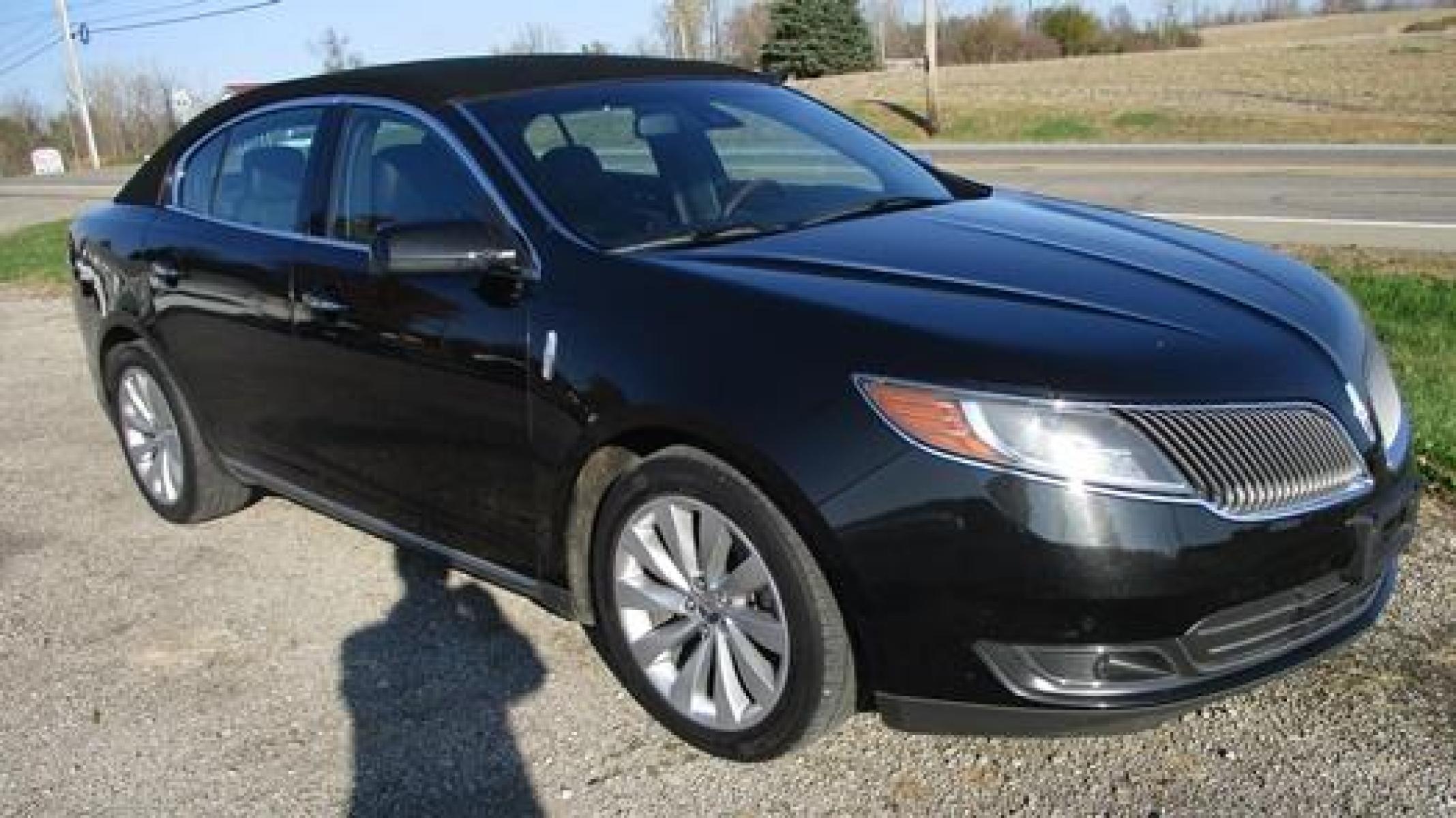 2014 Black /Black Lincoln MKS (1LNHL9EK7EG) with an 3.5L V6 DOHC 24V engine, 6-Speed Automatic transmission, located at 1725 US-68 N, Bellefontaine, OH, 43311, (937) 592-5466, 40.387783, -83.752388 - 2014 LINCOLN MKS "TUXEDO EDITION" AWD 3.7 v6, Auto, Black-Black Leather Int. w-power lumbar heated-cooled bucket seats, AM-FM-CD-MP3, Bluetooth, Sirius XM, NAVI, PW, PL, PB, PS w-tilt-cruise-controls, remote start, keyless entry, Power rear window sunshade, Presented in stunning Tuxedo Black, our - Photo #3