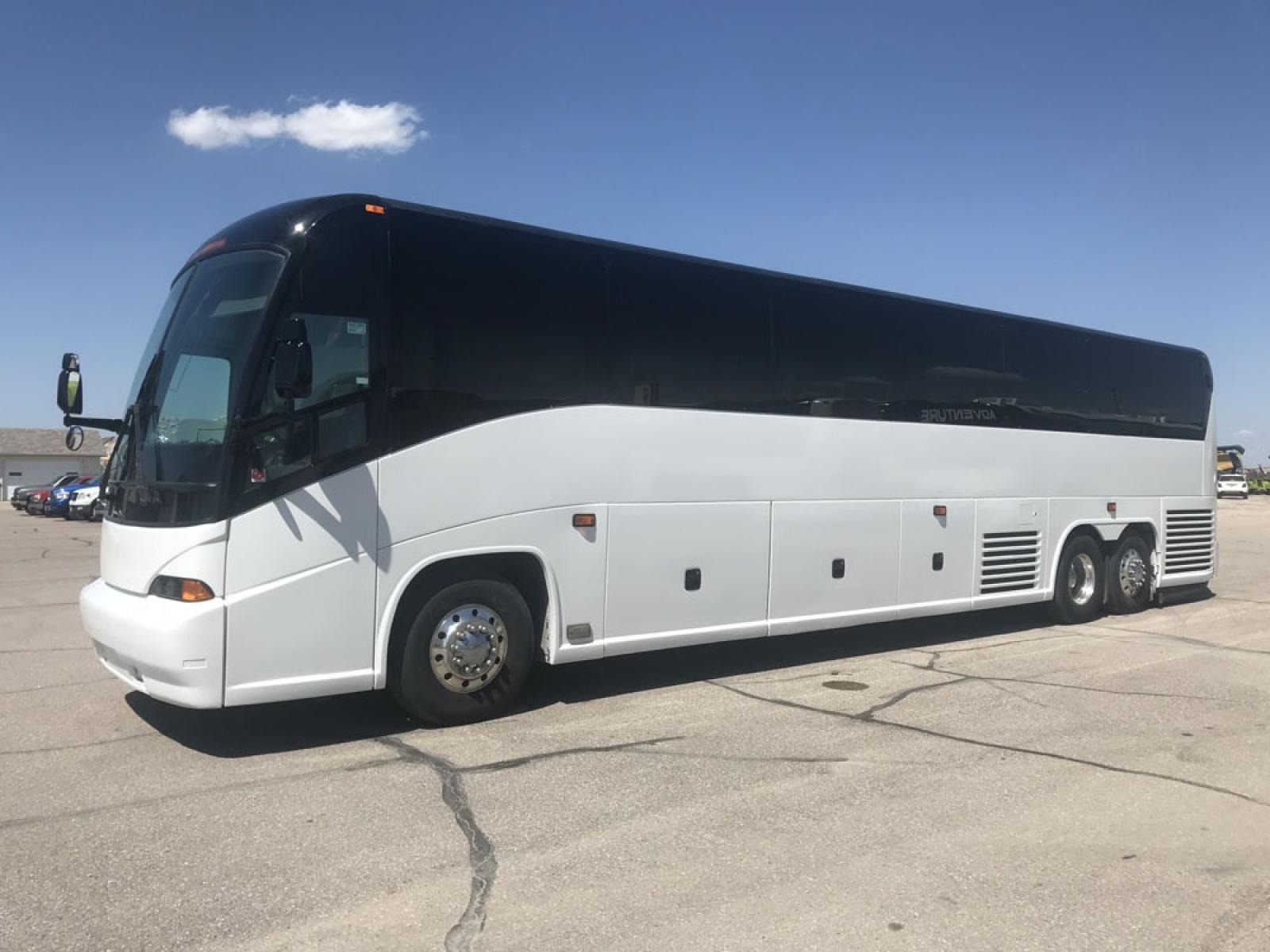 2008 White MCI J4500 with an Cummins ISM engine, ZF AUTO transmission, 0.000000, 0.000000 - 2008 MCI J4500 - Cummins ISM Diesel Engine - ZF Auto Trans. - 45' -- 56 Passengers -- Seat Belts - Flat Screens and DVD - Aluminum Wheels - Enclosed parcel racks – Restroom - Photo #1