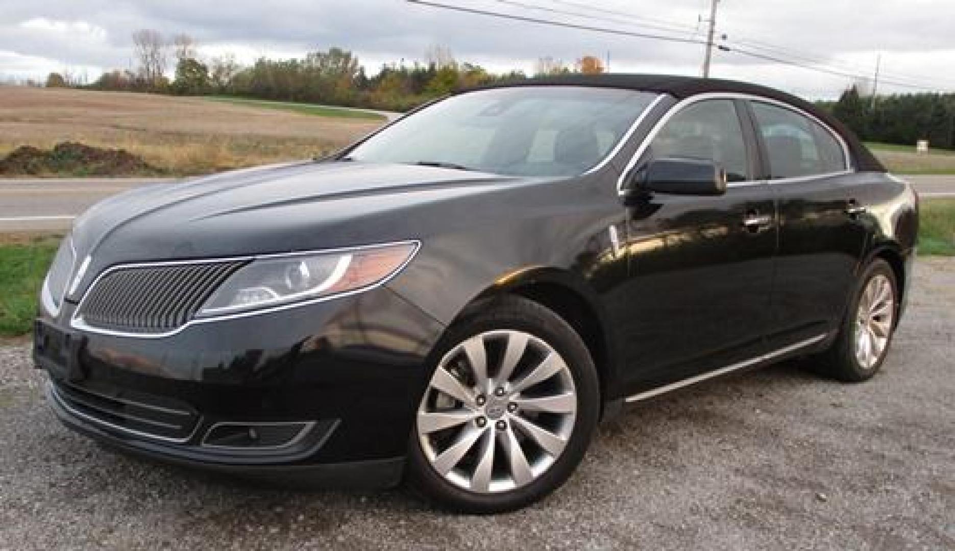 2014 Black /Black Lincoln MKS (1LNHL9EK3EG) with an 3.5L V6 DOHC 24V engine, 6-Speed Automatic transmission, located at 1725 US-68 N, Bellefontaine, OH, 43311, (937) 592-5466, 40.387783, -83.752388 - Presented in stunning Tuxedo Black, our 2014 Lincoln MKS "TUXEDO EDITION" AWD offers a superb blend of refined style and performance. Under the hood is a 3.7 Liter V6 that generates a healthy 305hp. This power is managed by a smooth shifting 6 Speed Automatic transmission that rewards you with impre - Photo#0