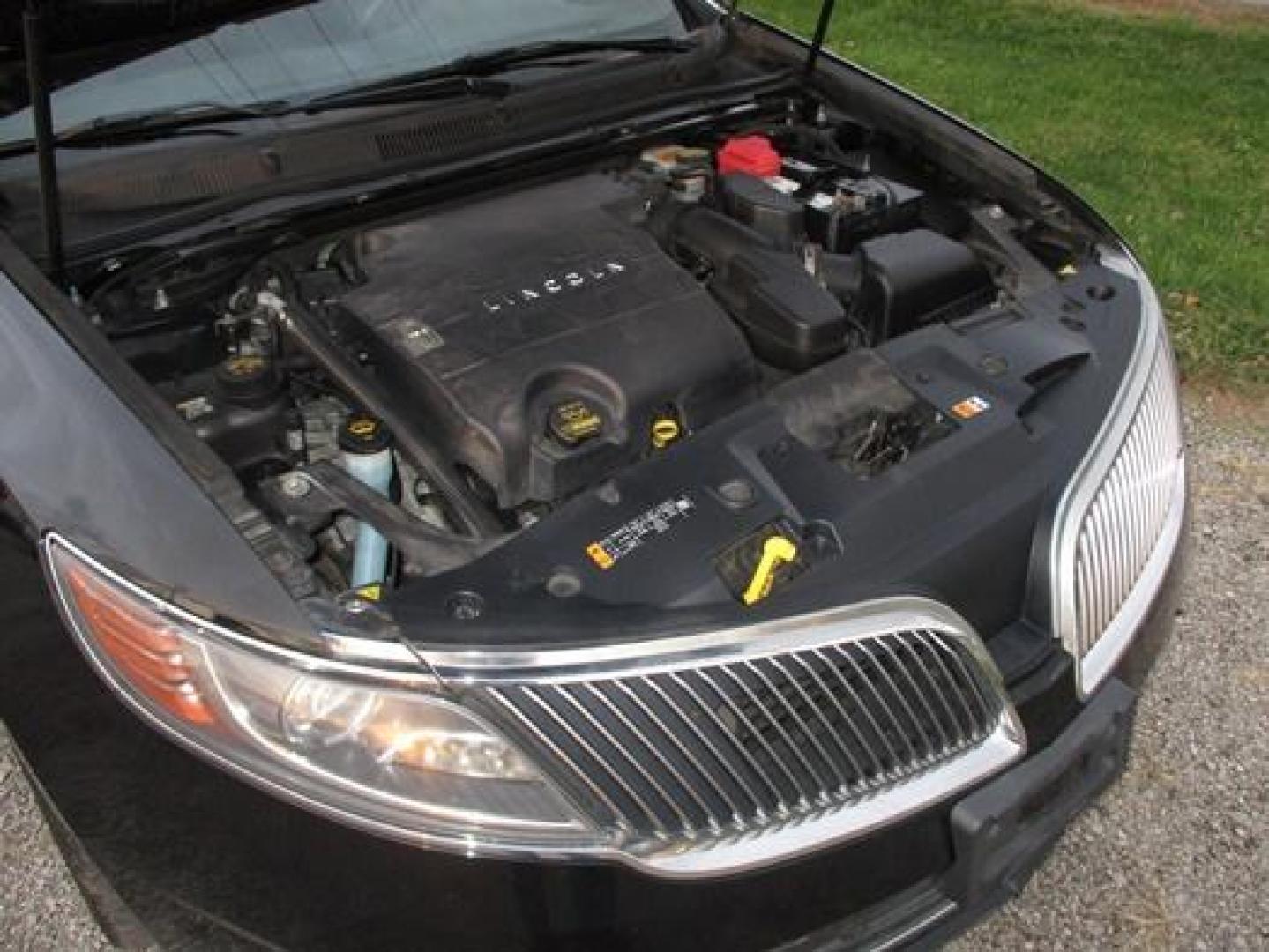 2014 Black /Black Lincoln MKS (1LNHL9EK3EG) with an 3.5L V6 DOHC 24V engine, 6-Speed Automatic transmission, located at 1725 US-68 N, Bellefontaine, OH, 43311, (937) 592-5466, 40.387783, -83.752388 - Presented in stunning Tuxedo Black, our 2014 Lincoln MKS "TUXEDO EDITION" AWD offers a superb blend of refined style and performance. Under the hood is a 3.7 Liter V6 that generates a healthy 305hp. This power is managed by a smooth shifting 6 Speed Automatic transmission that rewards you with impre - Photo#25