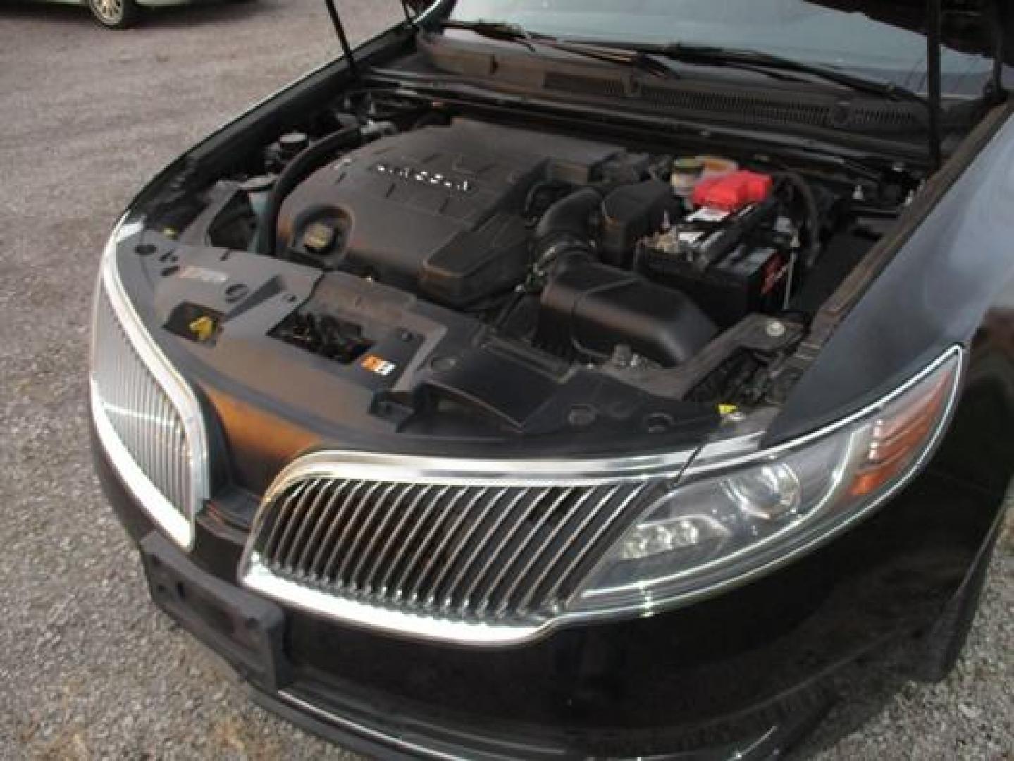 2014 Black /Black Lincoln MKS (1LNHL9EK3EG) with an 3.5L V6 DOHC 24V engine, 6-Speed Automatic transmission, located at 1725 US-68 N, Bellefontaine, OH, 43311, (937) 592-5466, 40.387783, -83.752388 - Presented in stunning Tuxedo Black, our 2014 Lincoln MKS "TUXEDO EDITION" AWD offers a superb blend of refined style and performance. Under the hood is a 3.7 Liter V6 that generates a healthy 305hp. This power is managed by a smooth shifting 6 Speed Automatic transmission that rewards you with impre - Photo#26