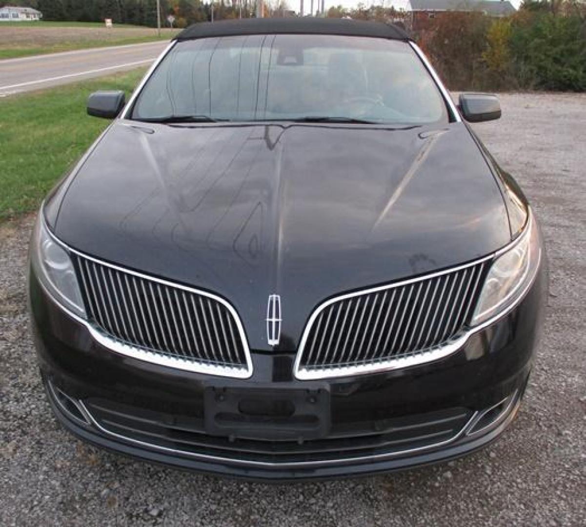 2014 Black /Black Lincoln MKS (1LNHL9EK3EG) with an 3.5L V6 DOHC 24V engine, 6-Speed Automatic transmission, located at 1725 US-68 N, Bellefontaine, OH, 43311, (937) 592-5466, 40.387783, -83.752388 - Presented in stunning Tuxedo Black, our 2014 Lincoln MKS "TUXEDO EDITION" AWD offers a superb blend of refined style and performance. Under the hood is a 3.7 Liter V6 that generates a healthy 305hp. This power is managed by a smooth shifting 6 Speed Automatic transmission that rewards you with impre - Photo#6