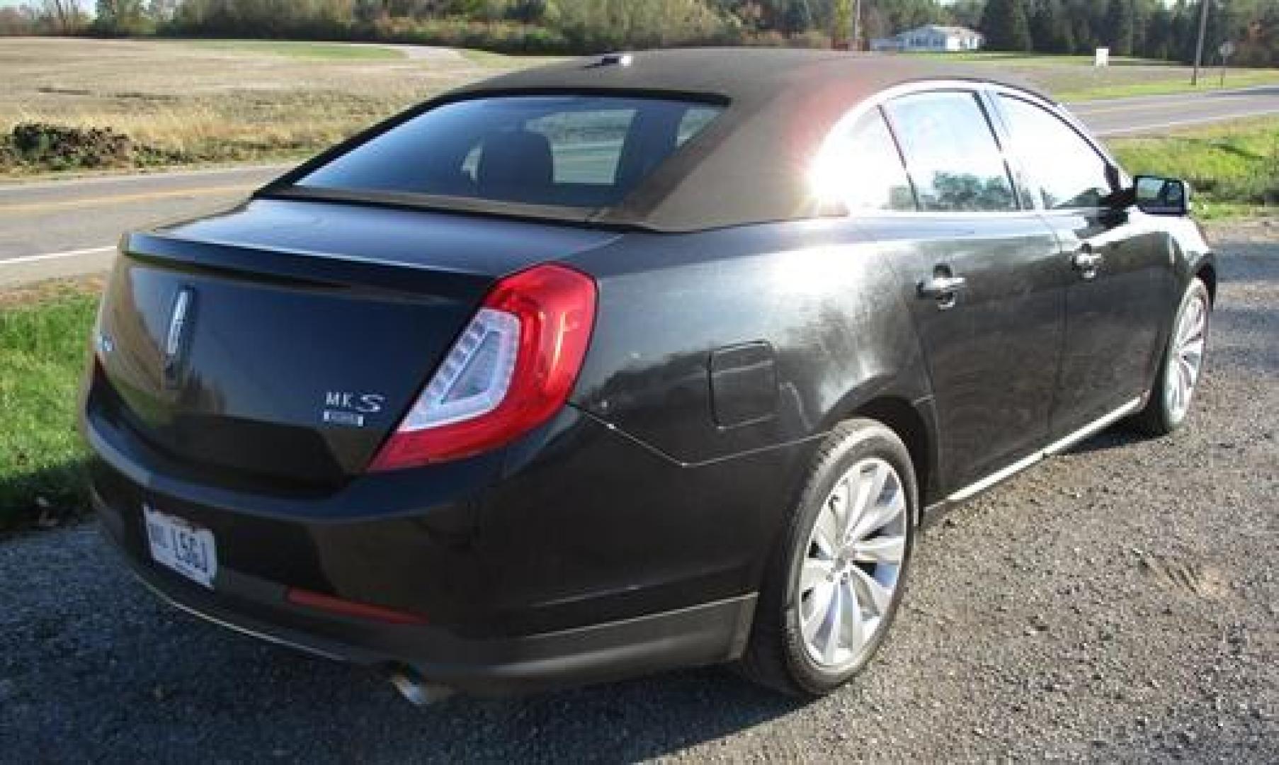 2014 Black /Black Lincoln MKS (1LNHL9EK7EG) with an 3.5L V6 DOHC 24V engine, 6-Speed Automatic transmission, located at 1725 US-68 N, Bellefontaine, OH, 43311, (937) 592-5466, 40.387783, -83.752388 - 2014 LINCOLN MKS "TUXEDO EDITION" AWD 3.7 v6, Auto, Black-Black Leather Int. w-power lumbar heated-cooled bucket seats, AM-FM-CD-MP3, Bluetooth, Sirius XM, NAVI, PW, PL, PB, PS w-tilt-cruise-controls, remote start, keyless entry, Power rear window sunshade, Presented in stunning Tuxedo Black, our - Photo#3