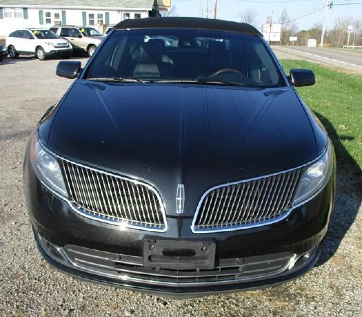 2014 Black /Black Lincoln MKS (1LNHL9EK7EG) with an 3.5L V6 DOHC 24V engine, 6-Speed Automatic transmission, located at 1725 US-68 N, Bellefontaine, OH, 43311, (937) 592-5466, 40.387783, -83.752388 - 2014 LINCOLN MKS "TUXEDO EDITION" AWD 3.7 v6, Auto, Black-Black Leather Int. w-power lumbar heated-cooled bucket seats, AM-FM-CD-MP3, Bluetooth, Sirius XM, NAVI, PW, PL, PB, PS w-tilt-cruise-controls, remote start, keyless entry, Power rear window sunshade, Presented in stunning Tuxedo Black, our - Photo#6