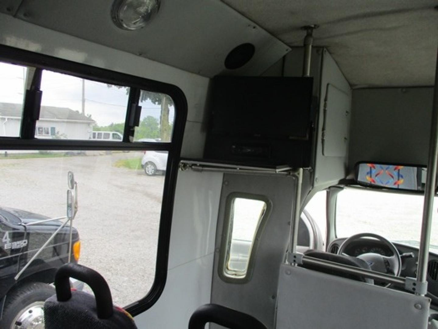 2003 Black /Blue Ford Econoline E450 Super Duty (1FDXE45F93H) with an 7.3L V8 OHV 16V TURBO DIESEL engine, Auto transmission, 0.000000, 0.000000 - 2003 FORD E450 GOSHEN “25 psg.” BUS, 7.3 Turbo Diesel, Auto, Black/Blue/Gray, Mid--Back Reclining side slide Seats, Flat Screen w/AM/FM/DVD/MP3, Manual Doors, Chrome Liners. - Photo#9