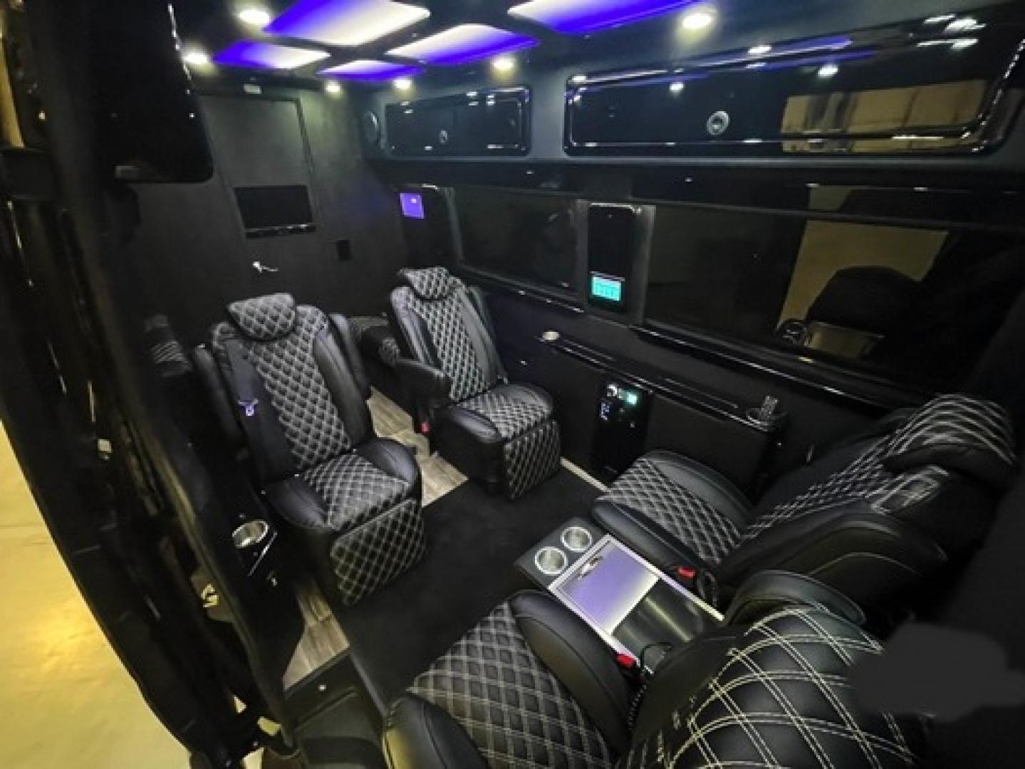 2023 /Black Mercedes-Benz Sprinter 3500 with an V8 engine, Automatic transmission, 0.000000, 0.000000 - 2023 MB Sprinter Midwest Luxury Cruiser 170” 3500, Black/Black Lth Int. Captain Seats w/Heat & Massage, 2, Power Leg Lifts, 2 LED TV’s, Rear Facing Seats w/hands free intercom, Wireless Internet Router, Apple TV, Maybach Lighted Ceiling Panel, LED Lighting, Folding Lap Top Tables, Heat/AC, Wind - Photo#16