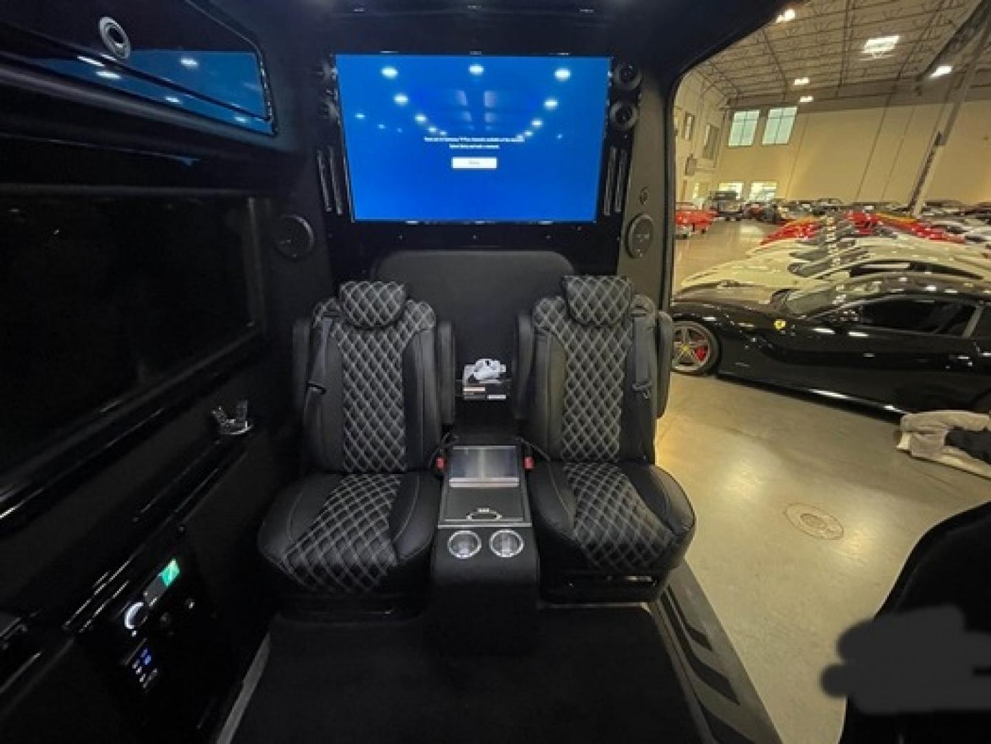 2023 /Black Mercedes-Benz Sprinter 3500 with an V8 engine, Automatic transmission, 0.000000, 0.000000 - 2023 MB Sprinter Midwest Luxury Cruiser 170” 3500, Black/Black Lth Int. Captain Seats w/Heat & Massage, 2, Power Leg Lifts, 2 LED TV’s, Rear Facing Seats w/hands free intercom, Wireless Internet Router, Apple TV, Maybach Lighted Ceiling Panel, LED Lighting, Folding Lap Top Tables, Heat/AC, Wind - Photo#23