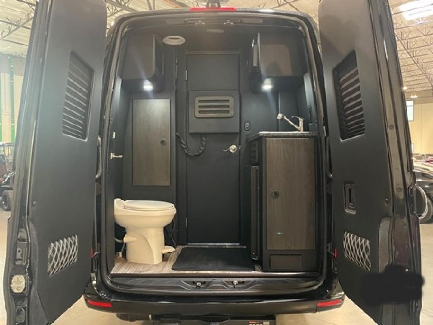 2023 /Black Mercedes-Benz Sprinter 3500 with an V8 engine, Automatic transmission, 0.000000, 0.000000 - 2023 MB Sprinter Midwest Luxury Cruiser 170” 3500, Black/Black Lth Int. Captain Seats w/Heat & Massage, 2, Power Leg Lifts, 2 LED TV’s, Rear Facing Seats w/hands free intercom, Wireless Internet Router, Apple TV, Maybach Lighted Ceiling Panel, LED Lighting, Folding Lap Top Tables, Heat/AC, Wind - Photo#24