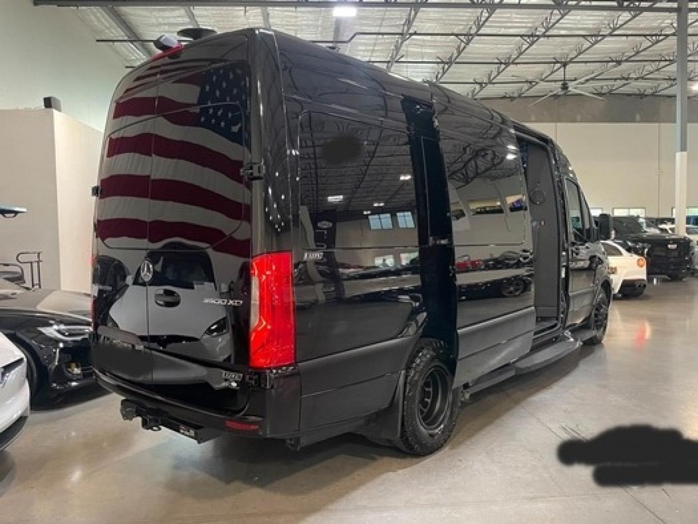 2023 /Black Mercedes-Benz Sprinter 3500 with an V8 engine, Automatic transmission, 0.000000, 0.000000 - 2023 MB Sprinter Midwest Luxury Cruiser 170” 3500, Black/Black Lth Int. Captain Seats w/Heat & Massage, 2, Power Leg Lifts, 2 LED TV’s, Rear Facing Seats w/hands free intercom, Wireless Internet Router, Apple TV, Maybach Lighted Ceiling Panel, LED Lighting, Folding Lap Top Tables, Heat/AC, Wind - Photo#2