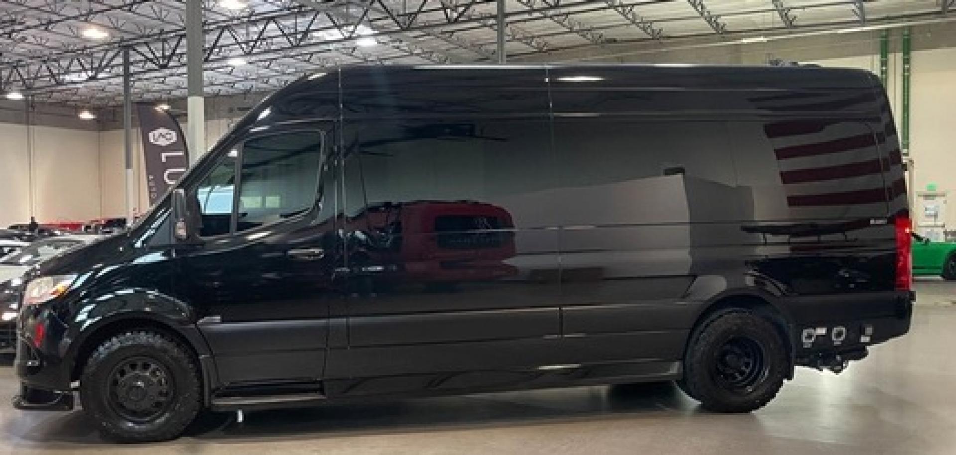 2023 /Black Mercedes-Benz Sprinter 3500 with an V8 engine, Automatic transmission, 0.000000, 0.000000 - 2023 MB Sprinter Midwest Luxury Cruiser 170” 3500, Black/Black Lth Int. Captain Seats w/Heat & Massage, 2, Power Leg Lifts, 2 LED TV’s, Rear Facing Seats w/hands free intercom, Wireless Internet Router, Apple TV, Maybach Lighted Ceiling Panel, LED Lighting, Folding Lap Top Tables, Heat/AC, Wind - Photo#3