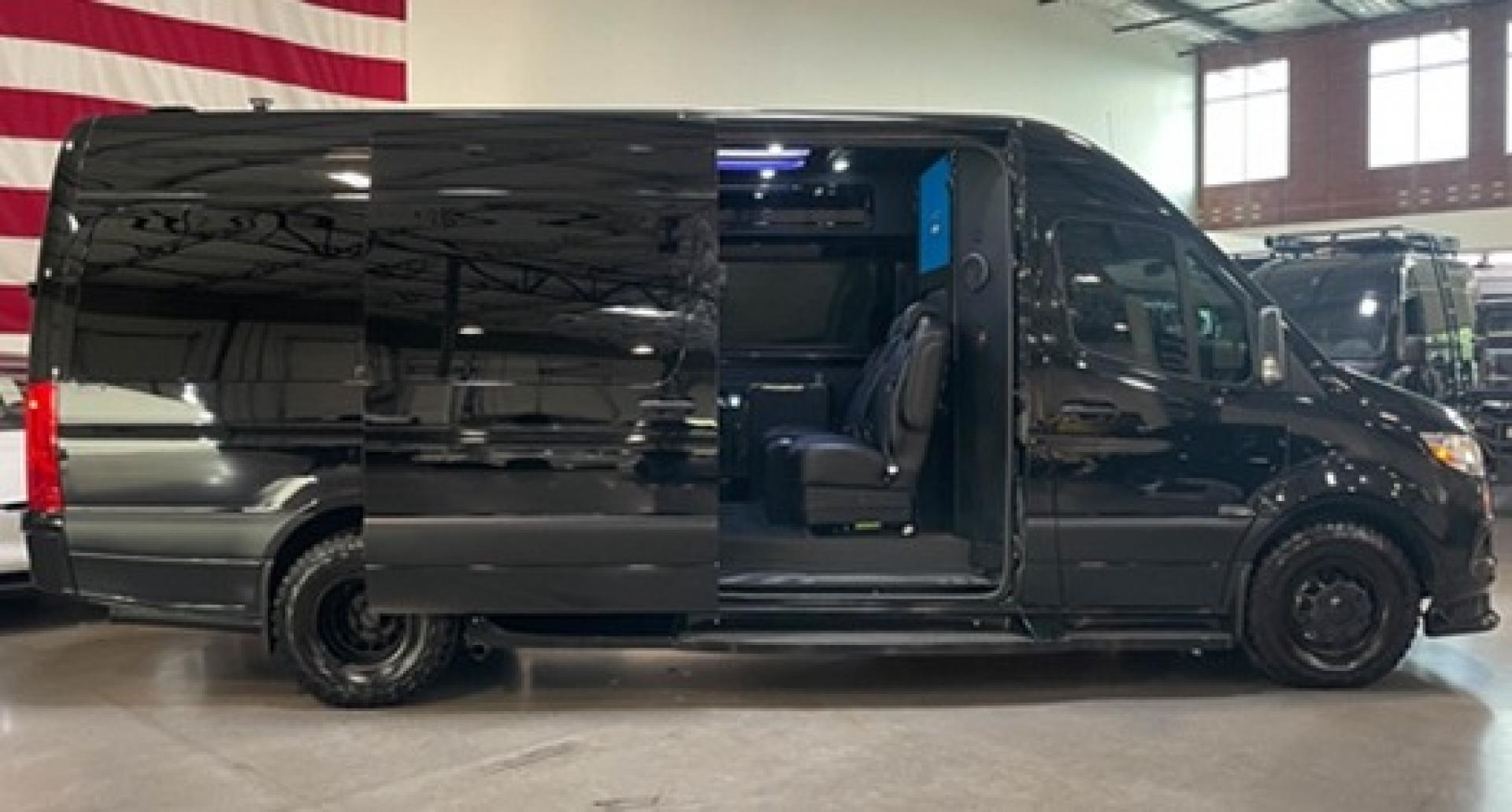 2023 /Black Mercedes-Benz Sprinter 3500 with an V8 engine, Automatic transmission, 0.000000, 0.000000 - 2023 MB Sprinter Midwest Luxury Cruiser 170” 3500, Black/Black Lth Int. Captain Seats w/Heat & Massage, 2, Power Leg Lifts, 2 LED TV’s, Rear Facing Seats w/hands free intercom, Wireless Internet Router, Apple TV, Maybach Lighted Ceiling Panel, LED Lighting, Folding Lap Top Tables, Heat/AC, Wind - Photo#4