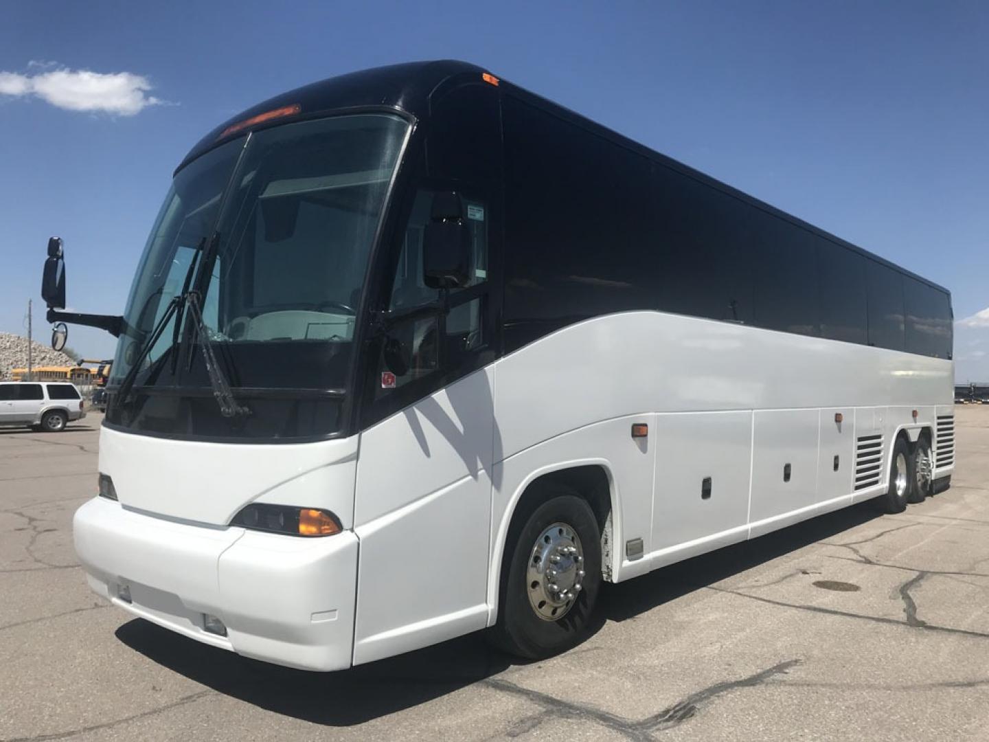 2008 White MCI J4500 with an Cummins ISM engine, ZF AUTO transmission, 0.000000, 0.000000 - 2008 MCI J4500 - Cummins ISM Diesel Engine - ZF Auto Trans. - 45' -- 56 Passengers -- Seat Belts - Flat Screens and DVD - Aluminum Wheels - Enclosed parcel racks – Restroom - Photo#0