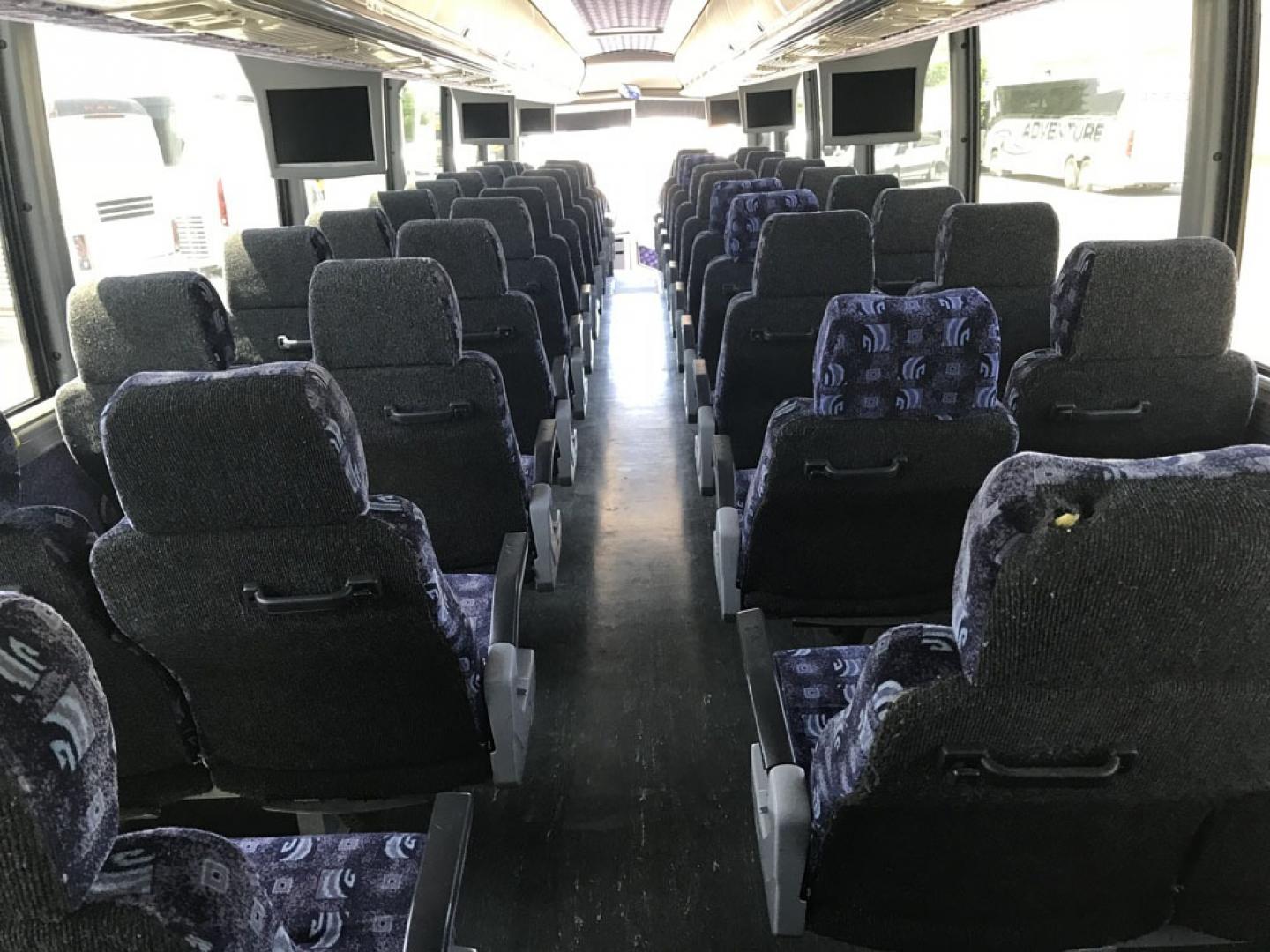 2008 White MCI J4500 with an Cummins ISM engine, ZF AUTO transmission, 0.000000, 0.000000 - 2008 MCI J4500 - Cummins ISM Diesel Engine - ZF Auto Trans. - 45' -- 56 Passengers -- Seat Belts - Flat Screens and DVD - Aluminum Wheels - Enclosed parcel racks – Restroom - Photo#5