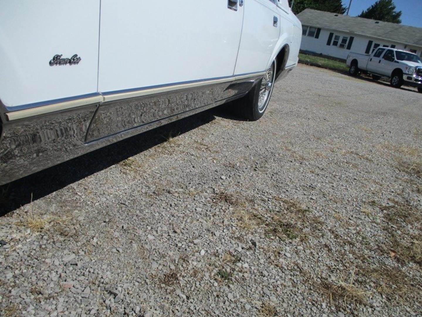 1989 White /White Lincoln Town Car (1LNBM82F7KY) with an V8 engine, Automatic transmission, located at 1725 US-68 N, Bellefontaine, OH, 43311, (937) 592-5466, 40.387783, -83.752388 - 1989 LINCOLN LUXURY TOWN CAR 5.0L V8, AUTO, Landau Top w/Coach Lights, White/White Leather Int., AM/FM/CASS, Opera Windows, Auto Lighting Power Antenna, PW, PL, Power Deck Release, Tilt Steering, Fingertip Speed Control, Alum Wire Wheels. Loaded with extras - Photo#11