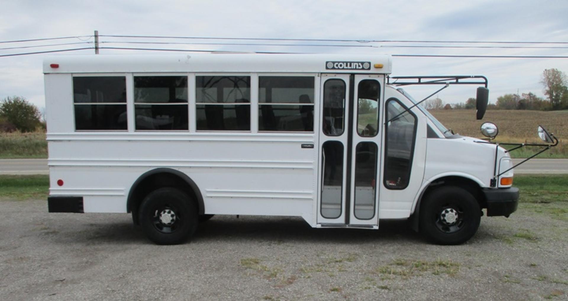 2006 White /Gray Chevrolet Express G3500 (1GBHG31V861) with an 4.8L V8 OHV 16V engine, 4-Speed Automatic transmission, located at 1725 US-68 N, Bellefontaine, OH, 43311, (937) 592-5466, 40.387783, -83.752388 - 2006 CHEVROLET “3500” 14 psg. + driver Collins Activity Bus, 4.8 V8, Auto, White/Gray, Bifold Entry Doors, Rear Door, AC/Heat Front & Rear, PS, PB, Hi-back Belted Seats, 4 Exterior Heated Mirrors, Tinted Windows, Roof & Rear Emergency Exits. Low Miles - Photo#3