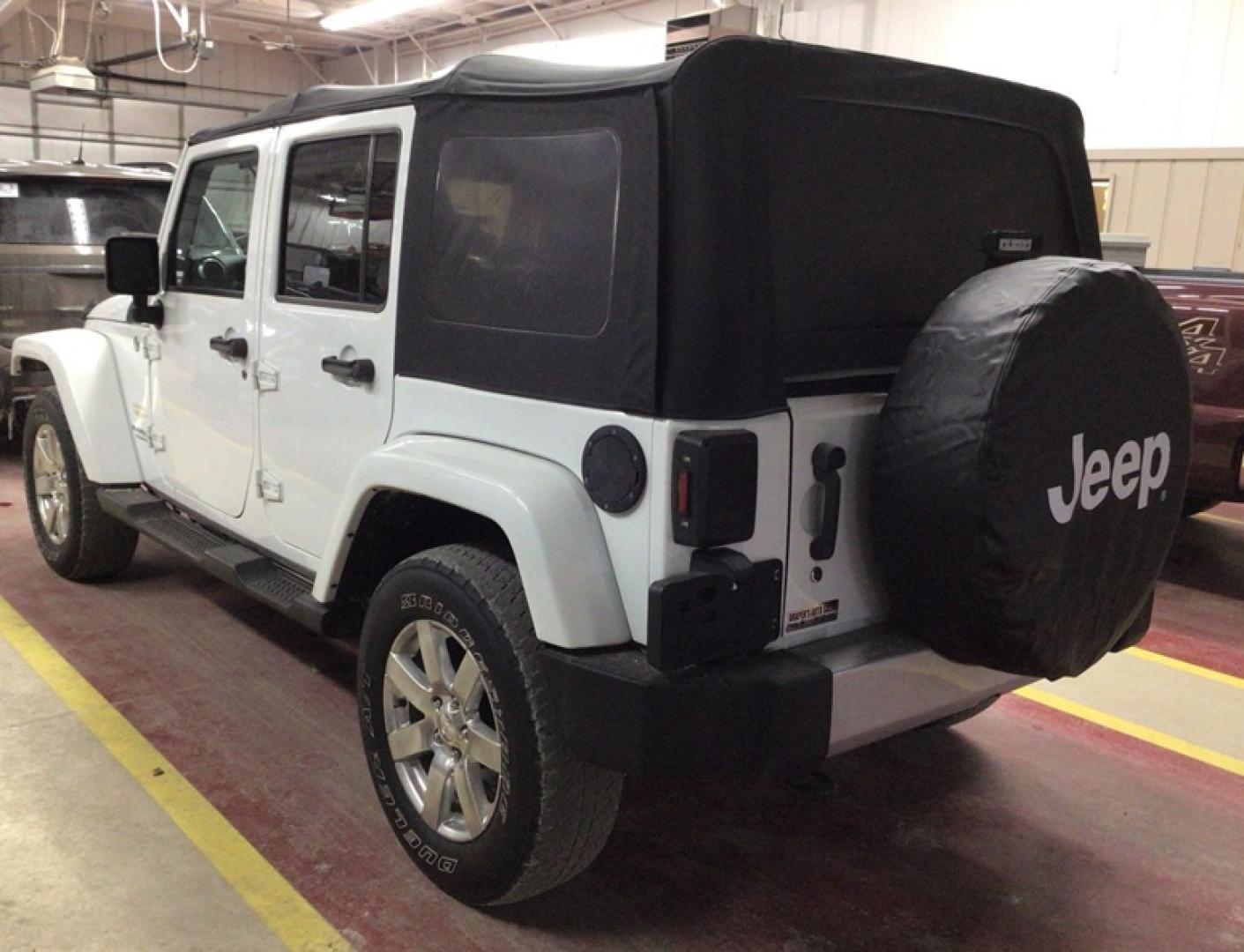 2015 White /Brown Jeep Wrangler Unlimited Sahara 4WD (1C4BJWEG8FL) with an 3.6L V6 DOHC 24V FFV engine, Auto transmission, located at 1725 US-68 N, Bellefontaine, OH, 43311, (937) 592-5466, 40.387783, -83.752388 - 2015 JEEP WRANGLER UNLIMITED SAHARA 4WD, 4D 3.6 V5, Auto, White W/Soft Convertible Black Top, Black Int., Front Bucket heated seat. Rear bench seat, AM/FM/CD/MP3/Sat, Heated PM, PW, PL, PB, PS Tilt/Cruise/Controls, Heat/A/C, Keyless Entry, Fog Lamps, Floor Mats, Rollover Prot. Bars, Running Boards/S - Photo#3