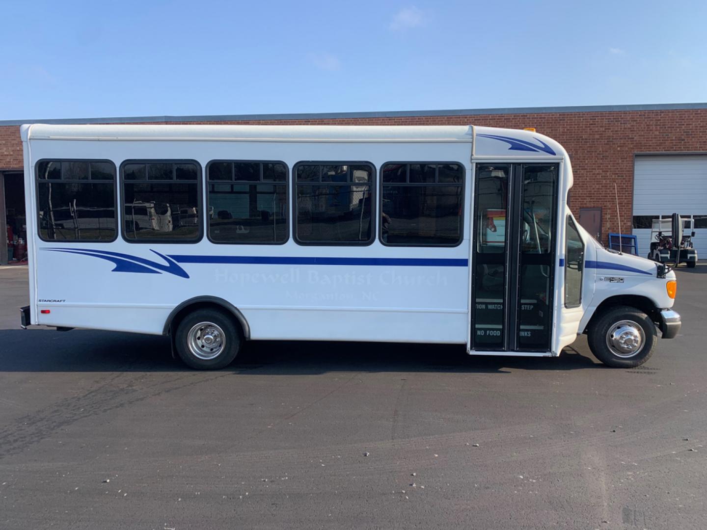 2004 White Ford E450 with an 6.8L V10 engine, Auton transmission, 0.000000, 0.000000 - 2004 Ford E-450 – 6.8L V10 – Auto – Electric Entrance Door – 25 passengers + Driver – High Back Reclining Seats – Aisle Sliders – Overhead Luggage – Reading Lights – Stainless Wheel Simulators – Front/Rear AC- Rear Door - Photo#2