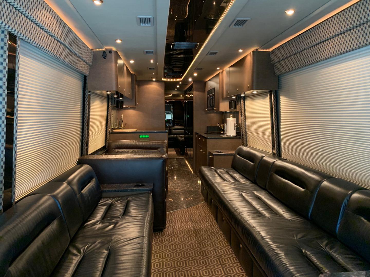 2006 Black MCI E4500 with an Caterpillar D13 Diesel engine, Allison transmission, 0.000000, 0.000000 - 2006 MCI – Caterpillar D13 Diesel, Allison Trans, 45’ Long, Front Lounge, Kitchen, Bath w/Shower, Rear Lounge (could convert to Bedroom), Closet Space, 2 Electric Awnings, 2 Roof A/C w/Heat Strips, 20KW EPS Diesel Generators, Aluminum Wheels, Interior by Amadas, One Owner, Garage Kept. - Photo#12