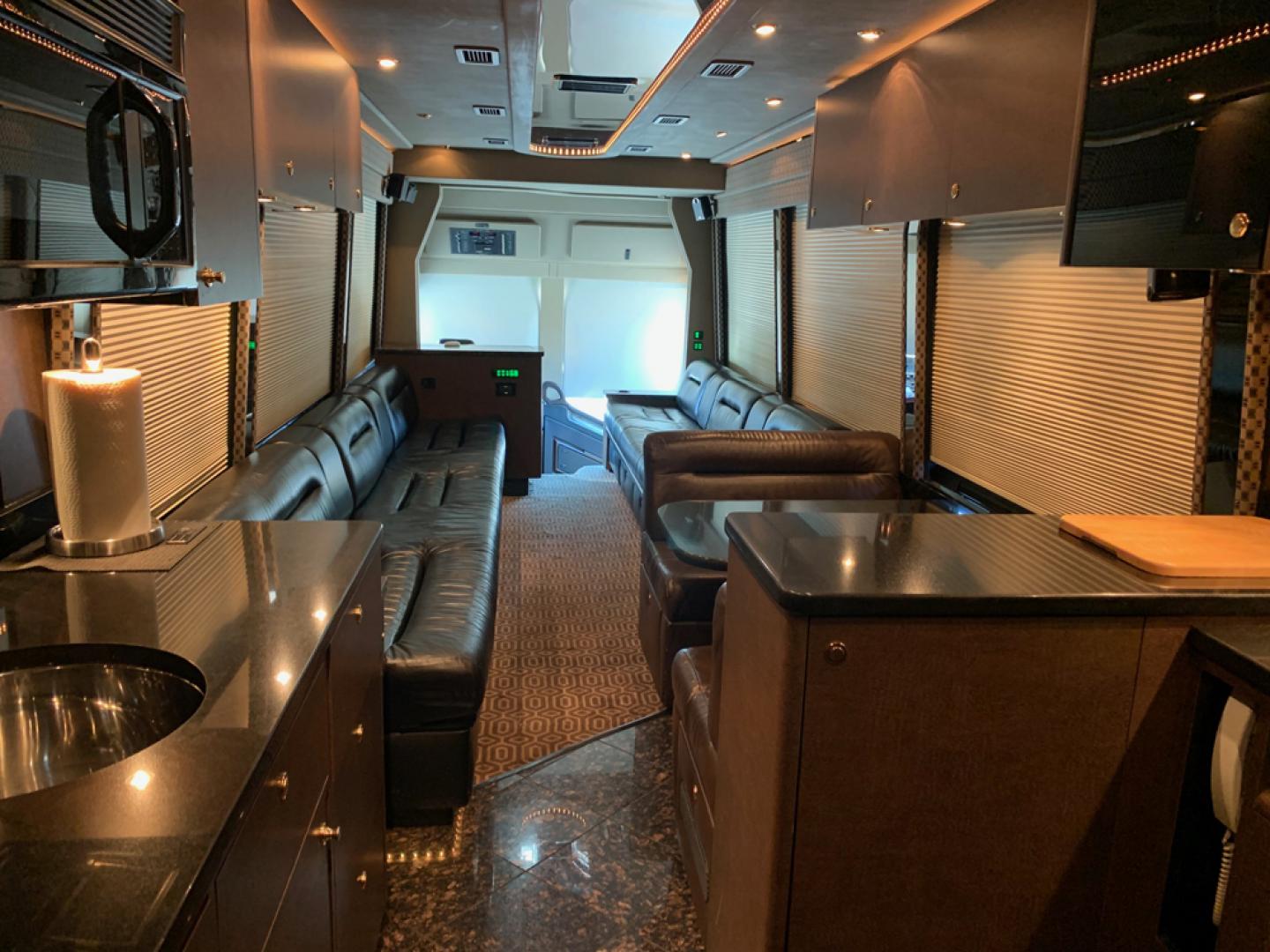 2006 Black MCI E4500 with an Caterpillar D13 Diesel engine, Allison transmission, 0.000000, 0.000000 - 2006 MCI – Caterpillar D13 Diesel, Allison Trans, 45’ Long, Front Lounge, Kitchen, Bath w/Shower, Rear Lounge (could convert to Bedroom), Closet Space, 2 Electric Awnings, 2 Roof A/C w/Heat Strips, 20KW EPS Diesel Generators, Aluminum Wheels, Interior by Amadas, One Owner, Garage Kept. - Photo#16