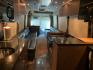 2006 Black MCI E4500 with an Caterpillar D13 Diesel engine, Allison transmission, 0.000000, 0.000000 - 2006 MCI – Caterpillar D13 Diesel, Allison Trans, 45’ Long, Front Lounge, Kitchen, Bath w/Shower, Rear Lounge (could convert to Bedroom), Closet Space, 2 Electric Awnings, 2 Roof A/C w/Heat Strips, 20KW EPS Diesel Generators, Aluminum Wheels, Interior by Amadas, One Owner, Garage Kept. - Photo#16