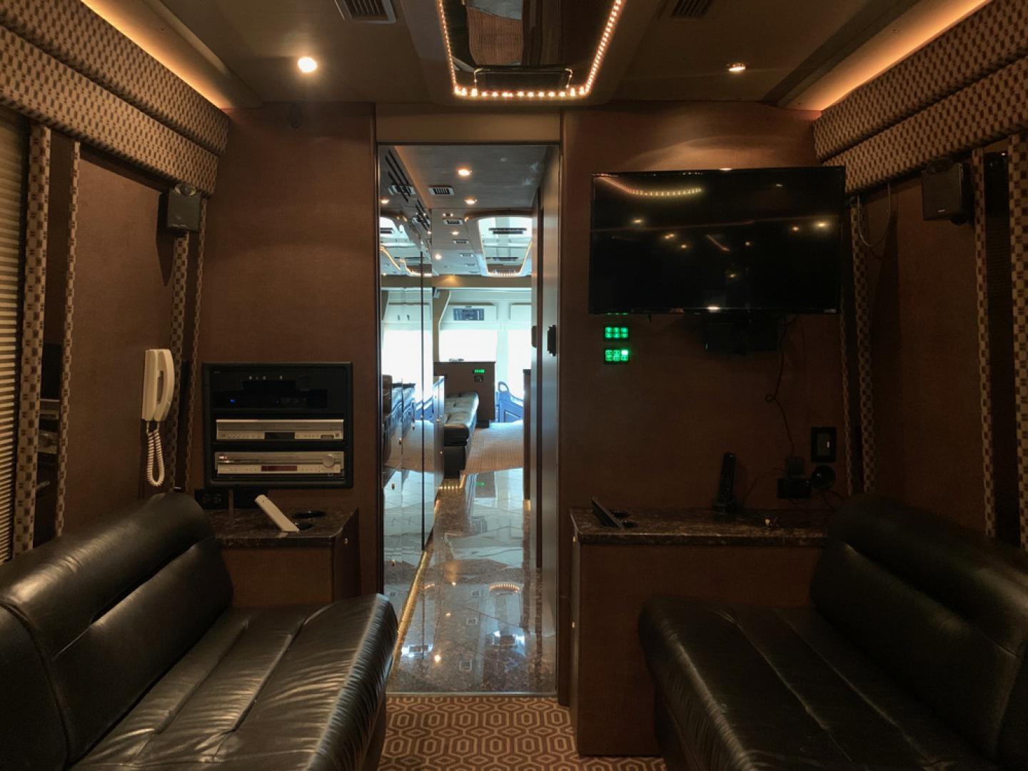 2006 Black MCI E4500 with an Caterpillar D13 Diesel engine, Allison transmission, 0.000000, 0.000000 - 2006 MCI – Caterpillar D13 Diesel, Allison Trans, 45’ Long, Front Lounge, Kitchen, Bath w/Shower, Rear Lounge (could convert to Bedroom), Closet Space, 2 Electric Awnings, 2 Roof A/C w/Heat Strips, 20KW EPS Diesel Generators, Aluminum Wheels, Interior by Amadas, One Owner, Garage Kept. - Photo#21