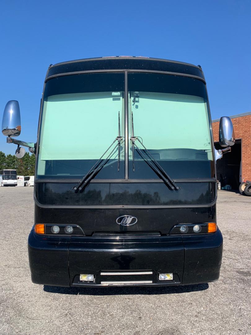 2006 Black MCI E4500 with an Caterpillar D13 Diesel engine, Allison transmission, 0.000000, 0.000000 - 2006 MCI – Caterpillar D13 Diesel, Allison Trans, 45’ Long, Front Lounge, Kitchen, Bath w/Shower, Rear Lounge (could convert to Bedroom), Closet Space, 2 Electric Awnings, 2 Roof A/C w/Heat Strips, 20KW EPS Diesel Generators, Aluminum Wheels, Interior by Amadas, One Owner, Garage Kept. - Photo#8