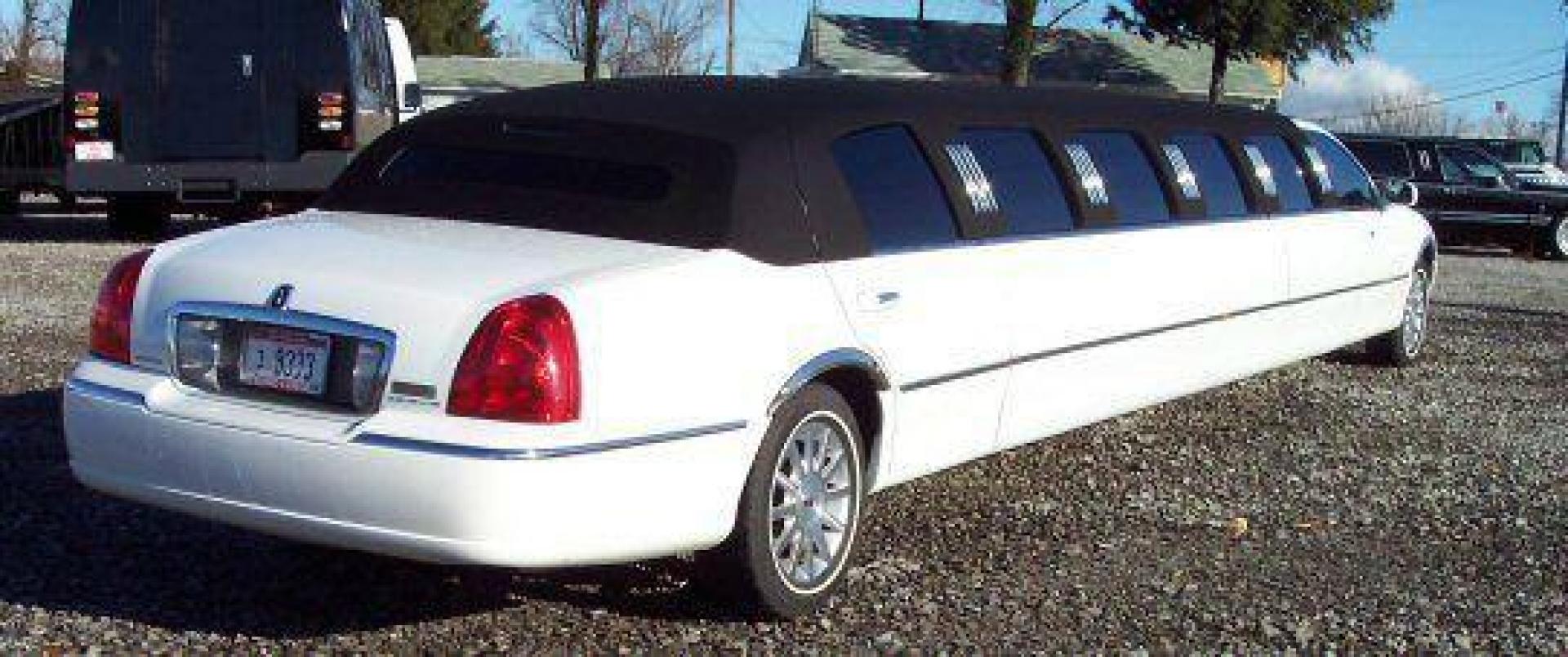 2006 White w/ Black (Tux) Lincoln Town Car (1LNHM81V06Y) with an V8, 4.6L; FFV; SOHC engine, located at 1725 US-68 N, Bellefontaine, OH, 43311, (937) 592-5466, 40.387783, -83.752388 - LINCOLN 180" SUPER STRETCH “5Dr”-AERGO "TUX “Edition” (White-Black Cloth Top) w-Lt. stone J-seat, deluxe black lacquered bar, mirrored fiber-optic ceiling, divider wall, & bar, 15” flat screen TV-AM-FM-CD-DVD-Karaoke, strobe-laser lights, champ-iceboxes, front-rear controls & dual alternat - Photo#1