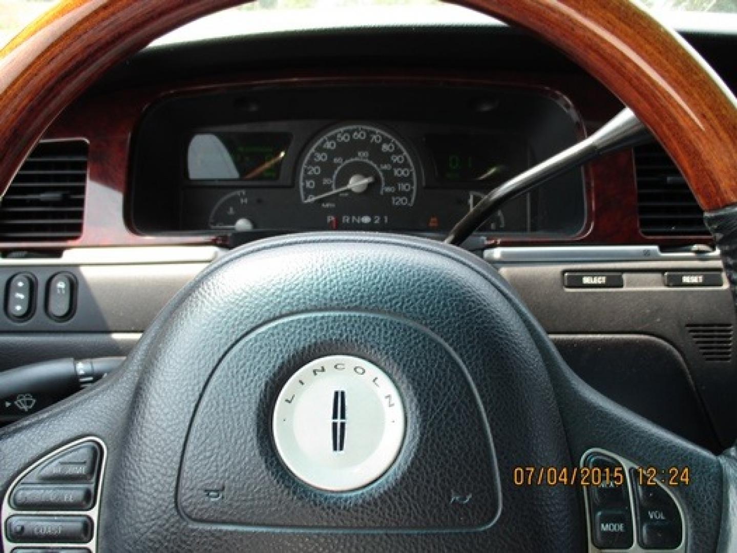 2004 White Lincoln Town Car (1LNHM83W44Y) with an 4.6-Liter 8 Cylinder Engine engine, located at 1725 US-68 N, Bellefontaine, OH, 43311, (937) 592-5466, 40.387783, -83.752388 - 2004 LINCOLN 180” SUPER STRETCH-ULTRA, White-Black Lth. J-Seat Int., Mirrored ceiling, AM-FM-CD-DVD-TV’s, bar w-champ-ice buckets & glassware, needs some exterior cosmetic workMAKE OFFER - Photo#11