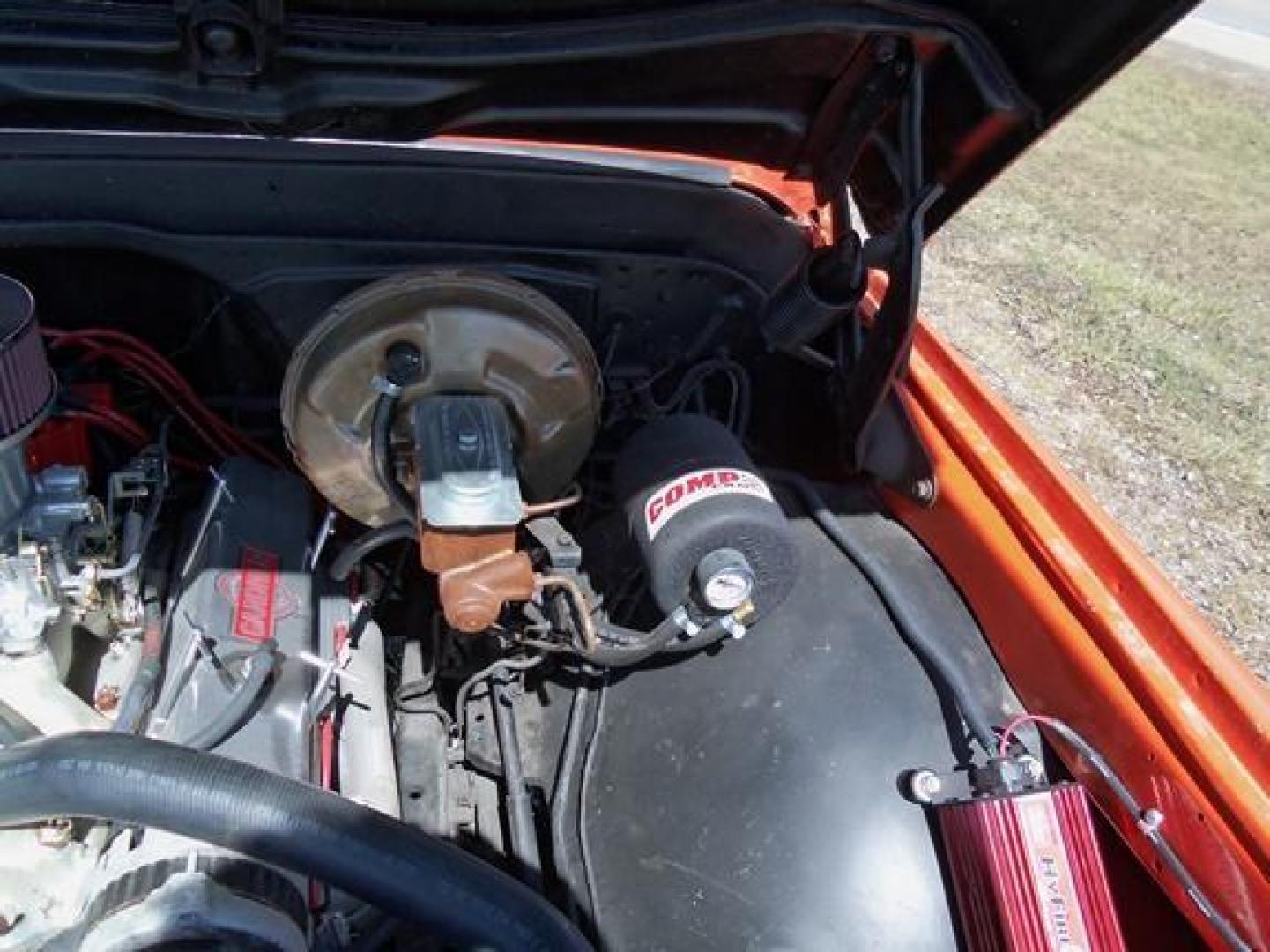 1970 Orange/White Chevrolet C10 with an 328 V8 engine, located at 1725 US-68 N, Bellefontaine, OH, 43311, (937) 592-5466, 40.387783, -83.752388 - 1970 CHEVROLET C10 CUSTOM ½ T Pick-up, High-performance “383 Stroker” V-8 w-headers Auto, Orange w-white Inserts, Black Lth Interior, custom wood steering wheel, PS, PB, Retro AM-FM-CD, gauges, dual exhaust, rally rims w-white letter tires, chrome bumpers & grille, Bed mat.	. Professionally wet - Photo#21