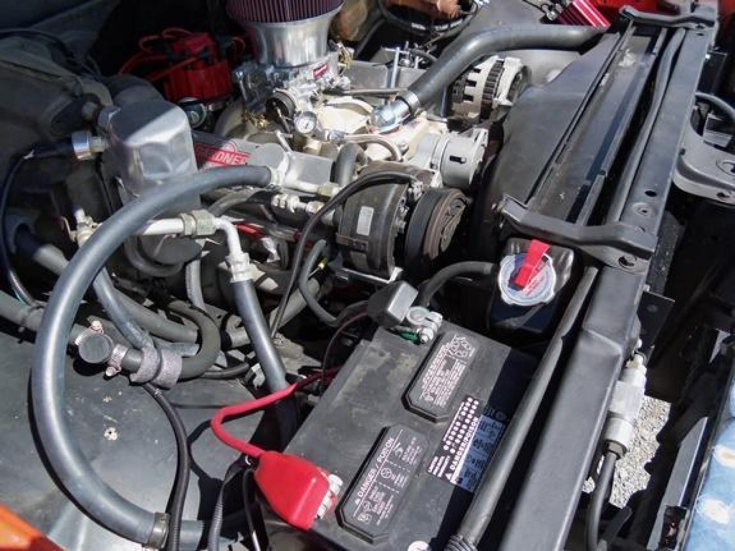 1970 Orange/White Chevrolet C10 with an 328 V8 engine, located at 1725 US-68 N, Bellefontaine, OH, 43311, (937) 592-5466, 40.387783, -83.752388 - 1970 CHEVROLET C10 CUSTOM ½ T Pick-up, High-performance “383 Stroker” V-8 w-headers Auto, Orange w-white Inserts, Black Lth Interior, custom wood steering wheel, PS, PB, Retro AM-FM-CD, gauges, dual exhaust, rally rims w-white letter tires, chrome bumpers & grille, Bed mat.	. Professionally wet - Photo#24