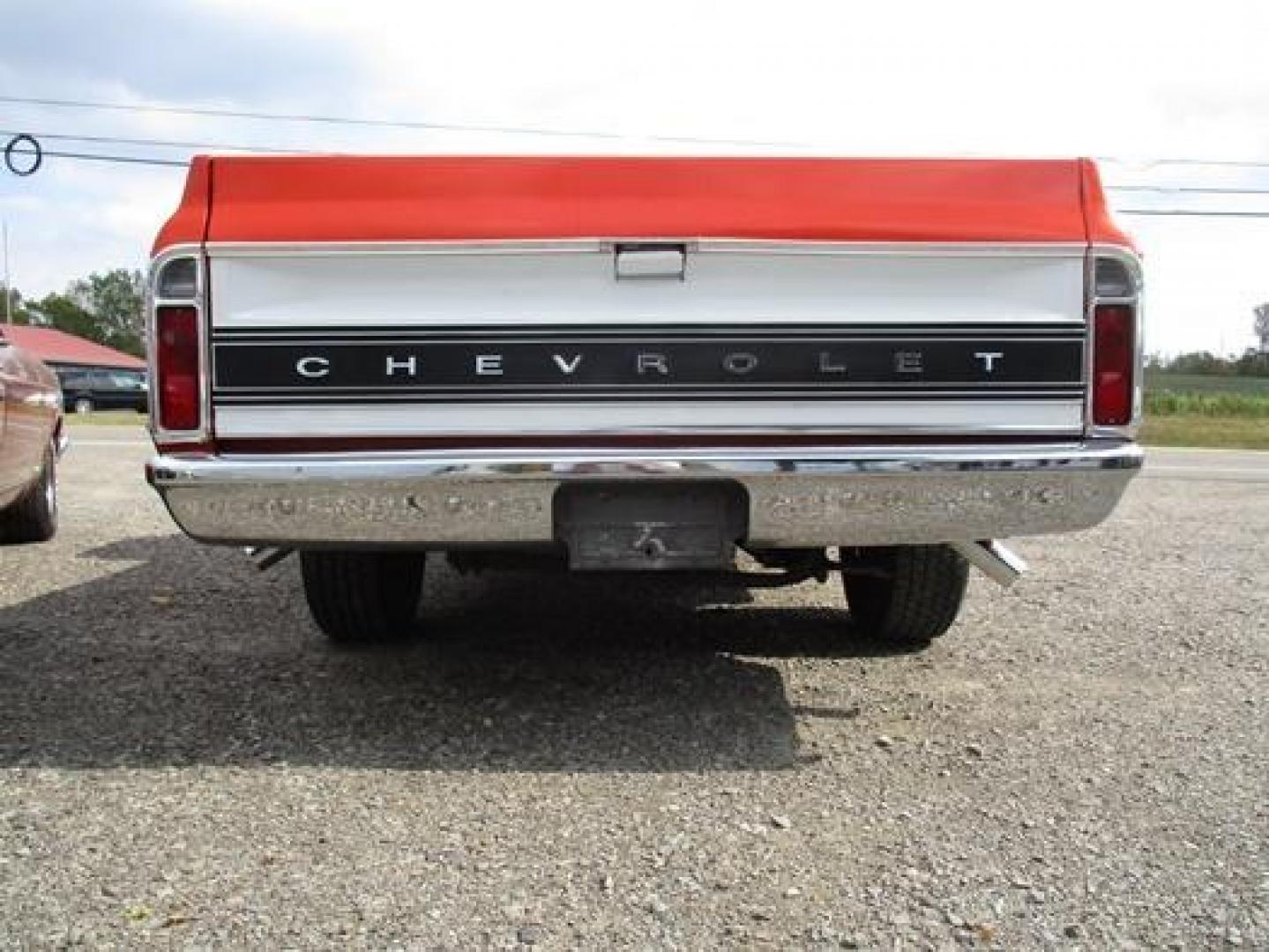 1970 Orange/White Chevrolet C10 with an 328 V8 engine, located at 1725 US-68 N, Bellefontaine, OH, 43311, (937) 592-5466, 40.387783, -83.752388 - 1970 CHEVROLET C10 CUSTOM ½ T Pick-up, High-performance “383 Stroker” V-8 w-headers Auto, Orange w-white Inserts, Black Lth Interior, custom wood steering wheel, PS, PB, Retro AM-FM-CD, gauges, dual exhaust, rally rims w-white letter tires, chrome bumpers & grille, Bed mat.	. Professionally wet - Photo#27